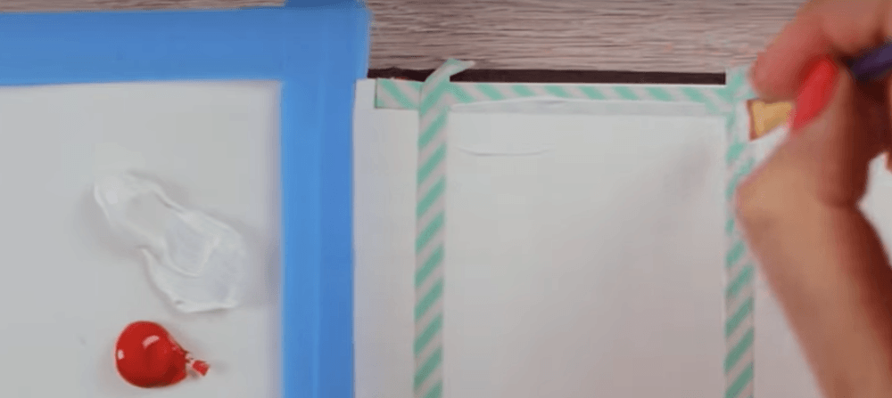 Creating a coat of white acrylic paint on top of the paper